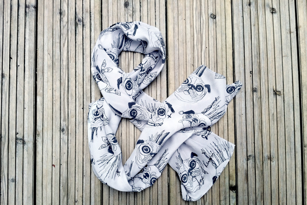 Age of Reason Studios, Ali Taylor's scarf ampersand
